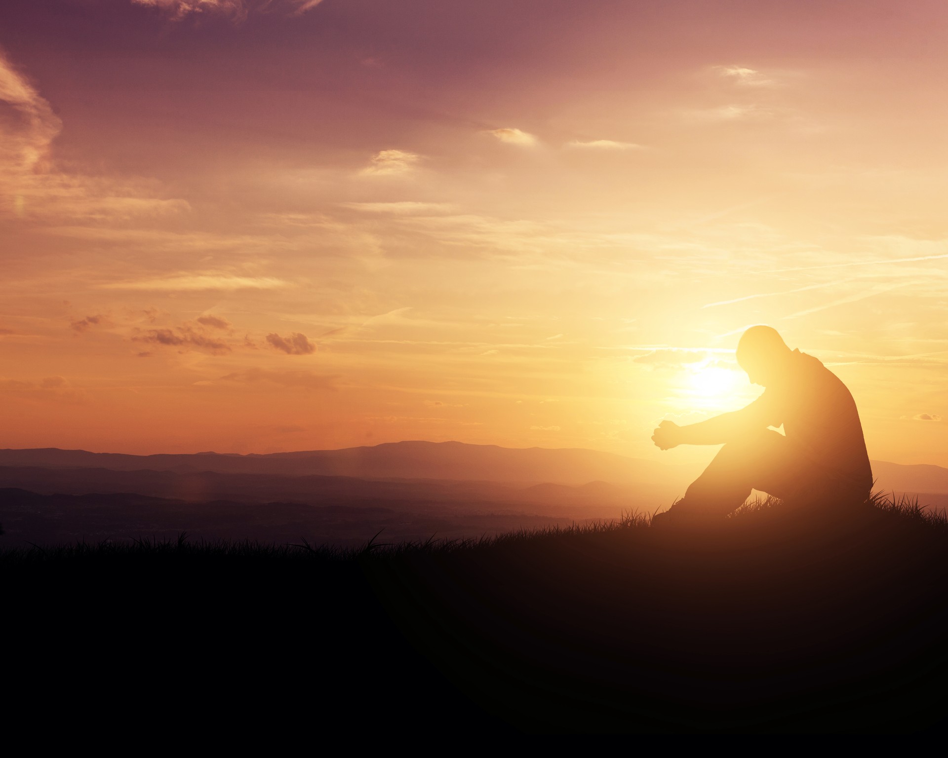 Praying at sunrise