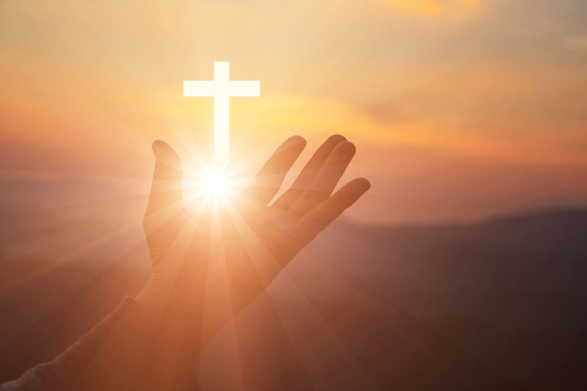 Silhouette of human hands palm up praying and worship of cross, eucharist therapy bless god helping, belief, forgiveness, freedom, hope and faith, christian religion concept on sunset background.